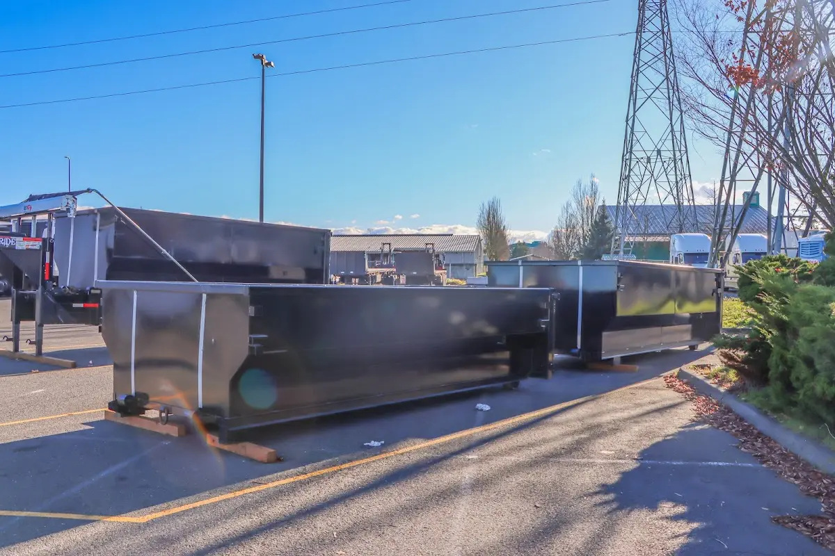 Roll-off dumpster ready for waste disposal at job site for 2 Yard Dumpster Rental in Bath